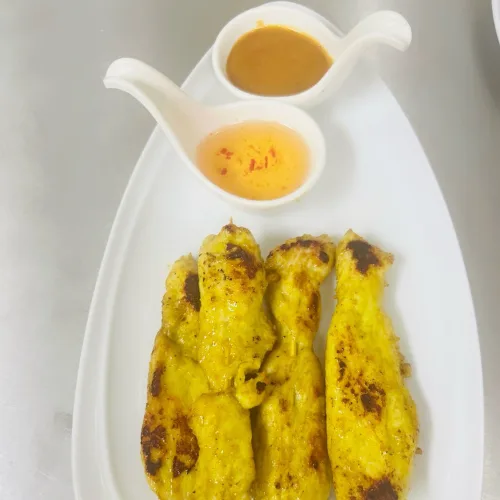 Chicken Satay - Grilled chicken skewers with peanut sauce